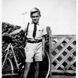 Hugh Nicol ready to leave for school from Solitary Street, 1950s