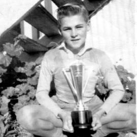 Hugh Nicol with the trophy won by Coffs Harbour High in a Kempsey knock-out football carnival, 1956