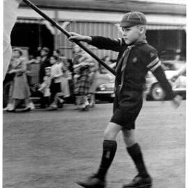 Coffs Jetty Boy Scout Hugh Nicol as leading flag holder, Anzac Day 1950s