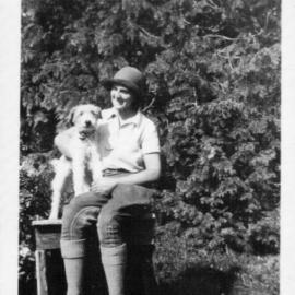 David Nicol's sister Jess with the family dog, 1950s