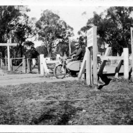 David Nicol on his Harley Davidson crossing the Queensland border near Stanthorpe, 1928