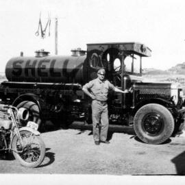 David Nicol with the Leyland Shell tanker and his Harley Davidson at the Coffs Jetty Depot, 1930s