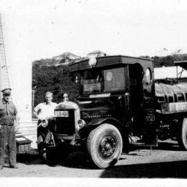  David Nicol and co-worker beside the Denis 600 gallon fuel tanker at the Coffs Jetty Depot, 1930s