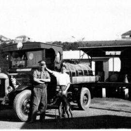 David Nicol and co-worker beside the Denis 600 gallon fuel tanker at the Coffs Jetty Depot, 1930s 