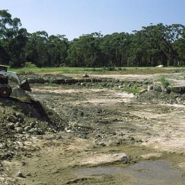 Building the lake's edge in the North Coast Regional Botanic Garden