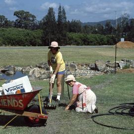 Laying irrigation pipe in the China Section of the North Coast Regional Botanic Garden
