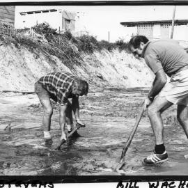 Bill Walker and Keith Stevens level the site ready for the concrete pour for the new Sawtell Surf Clubhouse, 1982 