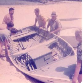 Bailey family with fishing boat at the bay in Sawtell