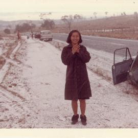 Rotary Club exchange student Kanit Sriangura in the snow on the road to Dorrigo, late 1960s