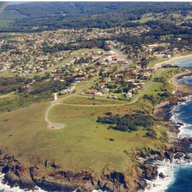 Aerial view of Woolgoolga Headland and beaches, 1992-1994 