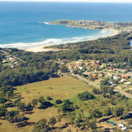 Aerial view of Safety Beach village and Woolgoolga Lake, June 1994