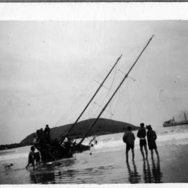 A beached boat on Jetty Beach, 24 June 1950