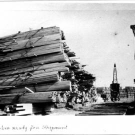 Timber stockpile at Coffs Harbour Jetty waiting for shipment, early 1900s