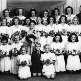 Eileen Keeley with her music pupils after their annual recital, 1950s