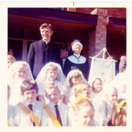 Father Tony Casey and Sister Evangelista with First Communion children at St Augustine's School, 20 August 1972 