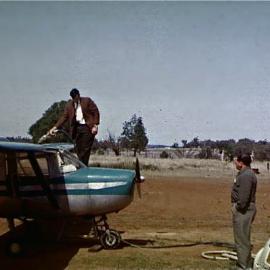 Robin Jelliffe filling a Cessna 150, 1964