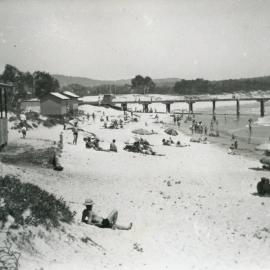 Beachgoers scattered on Woolgoolga Beach, 1960s