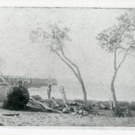 Alex Mowles sitting on an SS Orara buoy south of Woolgoolga Jetty, c.1899