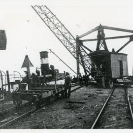 Loading timber at Woolgoolga Jetty, early 1900s