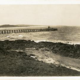 View of Woolgoolga Jetty from Yellowtail Rocks, February 1945