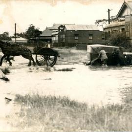 Dick Heskett and horse saving Dr John Mulhearn's car, 1947 