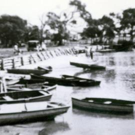 Boats on river bank, Red Rock