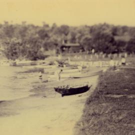 Boats on Red Rock River bank