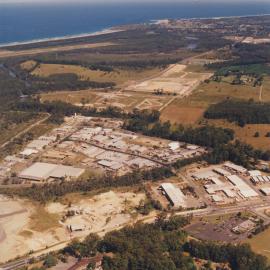 Aerial view of Cook Drive industrial estate of Coffs Harbour, 1990s