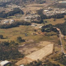 Aerial view of the Pacific Highway through southern Coffs Harbour, 1990s