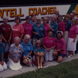 Tour group beside a Sawtell Coaches bus