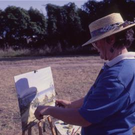 Painting 'en plein air' by the beach