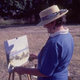 Painting 'en plein air' by the beach