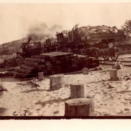 Steam train transporting rocks to the proposed northern breakwall, 1915 - 1918 