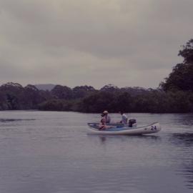 Kayak and tinnie on Coffs Creek