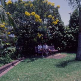 People on a park bench, City Centre Mall