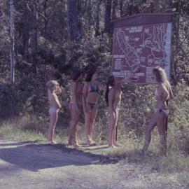 Women consult signage in the Bruxner Park Flora Reserve, 1970s