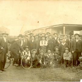 A group of cyclists and supporters