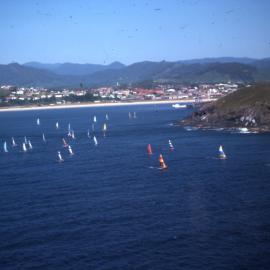 Hobie catamarans sail past Muttonbird Island, 1977