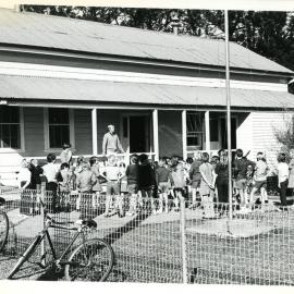 Principal George Gelagin and Assistant Teacher Robyn Rowe at Upper Orara Primary School assembly, 1978 