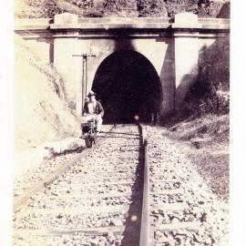 Reg Young emerging from the No. 2 tunnel between Karangi and Coffs Harbour, 1924