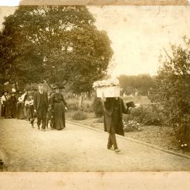 A small procession for a child's funeral