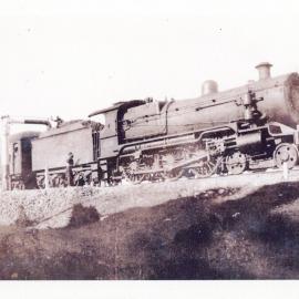 An express train takes on water, 1924