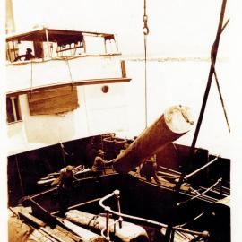 Loading logs onto T. S. S. Coombar, 1924