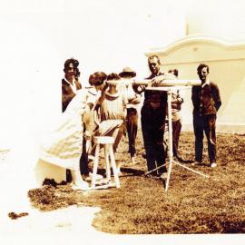 Looking through the telescope at South Solitary Island, 30 November 1924