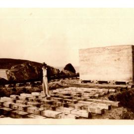 Reg Young with a 40 ton concrete block for the breakwater, 1924