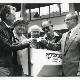 Matt Singleton draws a ticket for the Orchid Society, September 1990