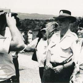 An arrest at an Emerald Beach rally, 26 November 1991