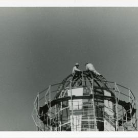 Scaffolding around the original Smoky Cape light during dismantling, 1977 