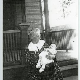 Portrait of grandmother with baby