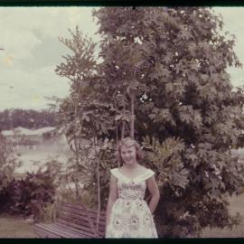 Woman in garden, c. 1960s